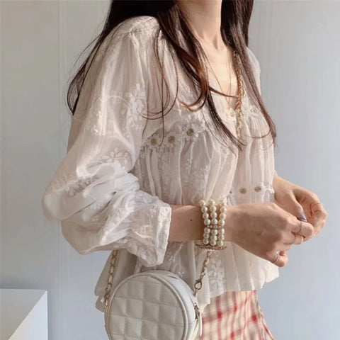 White blouse with V-neck & trumpet sleeves in Korean style