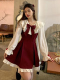 Alternative Gothic-Lolita dress with ruffles and bows in burgundy