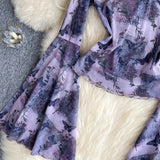 リボン柄とトランペットスリーブが特徴のオフショルダーメッシュトップ