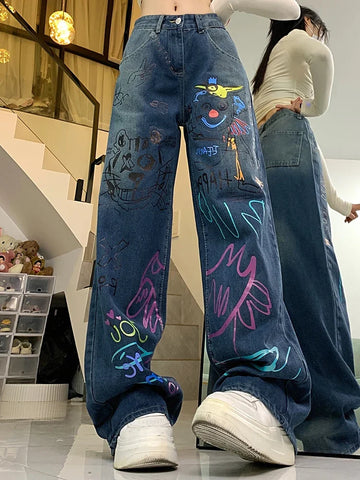 High-waisted graffiti jeans for 90s fashion