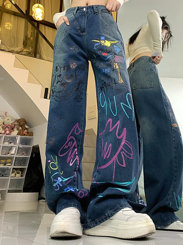 High-waisted graffiti jeans for 90s fashion