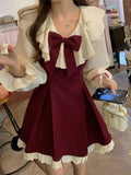 Alternative Gothic-Lolita dress with ruffles and bows in burgundy