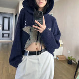 dark blue Y2K sweater with star pattern