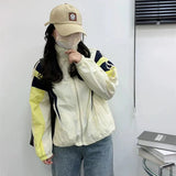 オーバーサイズのフーディーウィンドブレーカー付きパッチワークゴープコアカーディガン