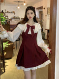 Alternative Gothic-Lolita dress with ruffles and bows in burgundy