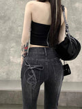 Gothic Flared Jeans with Bows and Raw Edge Hem