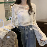 Knitted Crop Top with Hole Pattern and O-Neck for a Trendy Look
