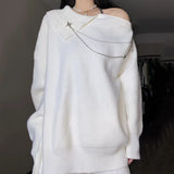 Y2K Pullover with asymmetric cut and star chain