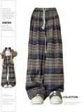 Women’s Grunge Checkered Baggy Pants Streetwear in Retro Style of the 2000s