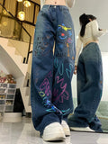 High-waisted graffiti jeans for 90s fashion