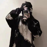 安全ピン付きダメージ加工ブラックセーター