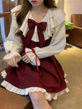 Alternative Gothic-Lolita dress with ruffles and bows in burgundy