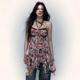 Unconventional dress in grunge style with spaghetti straps