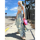 バットデザインのリップが入ったオーバーサイズスケータージーンズ