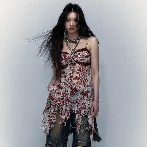 Unconventional dress in grunge style with spaghetti straps
